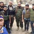 مصور "الطفل عمران" لا يظهر في هذه الصورة مع قاطع رأس العنصر من "لواء القدس"